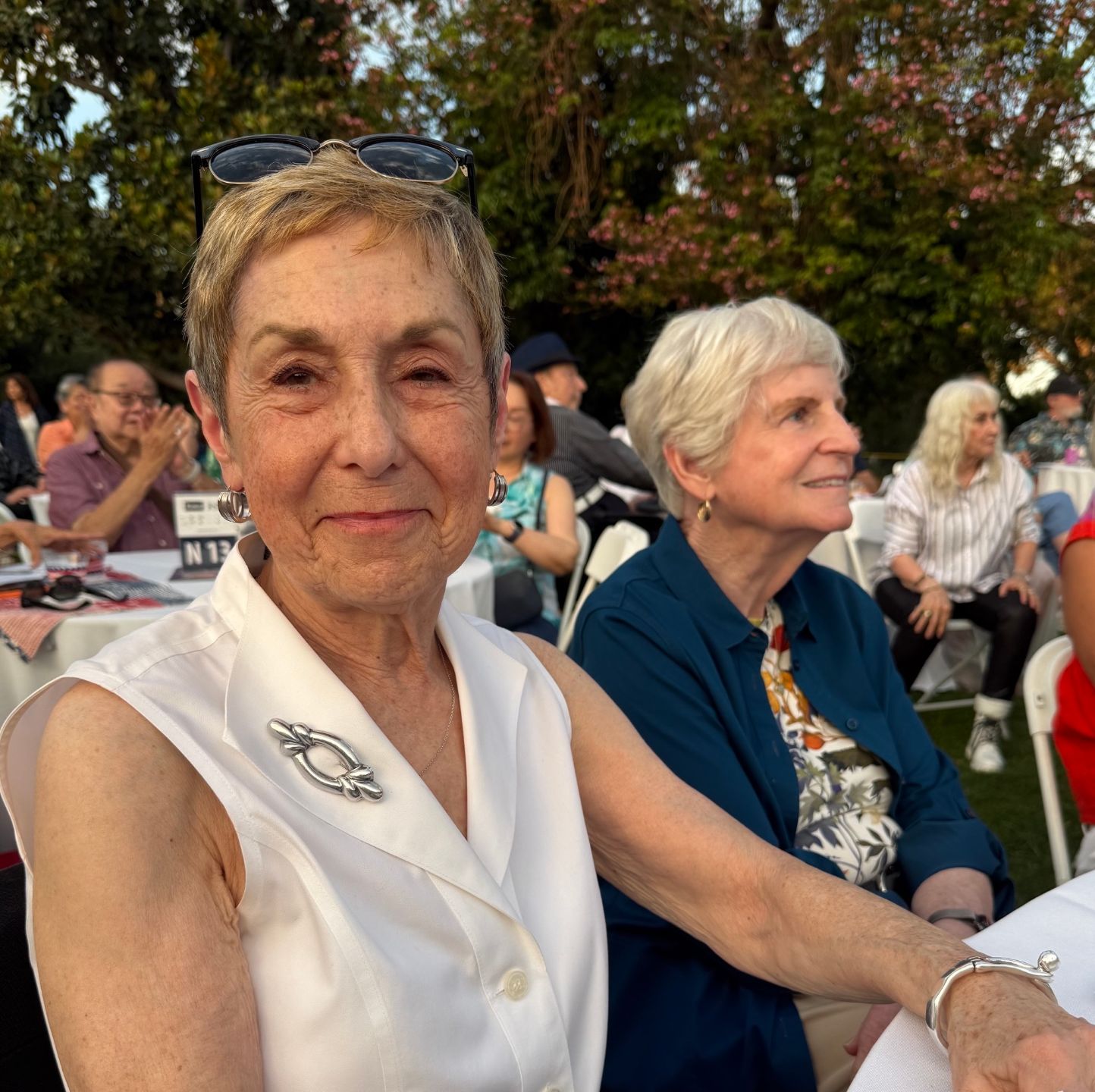 two women at a concert