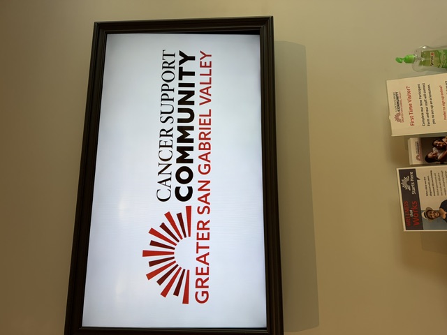 a TV Screen showing the Cancer Support Community logo