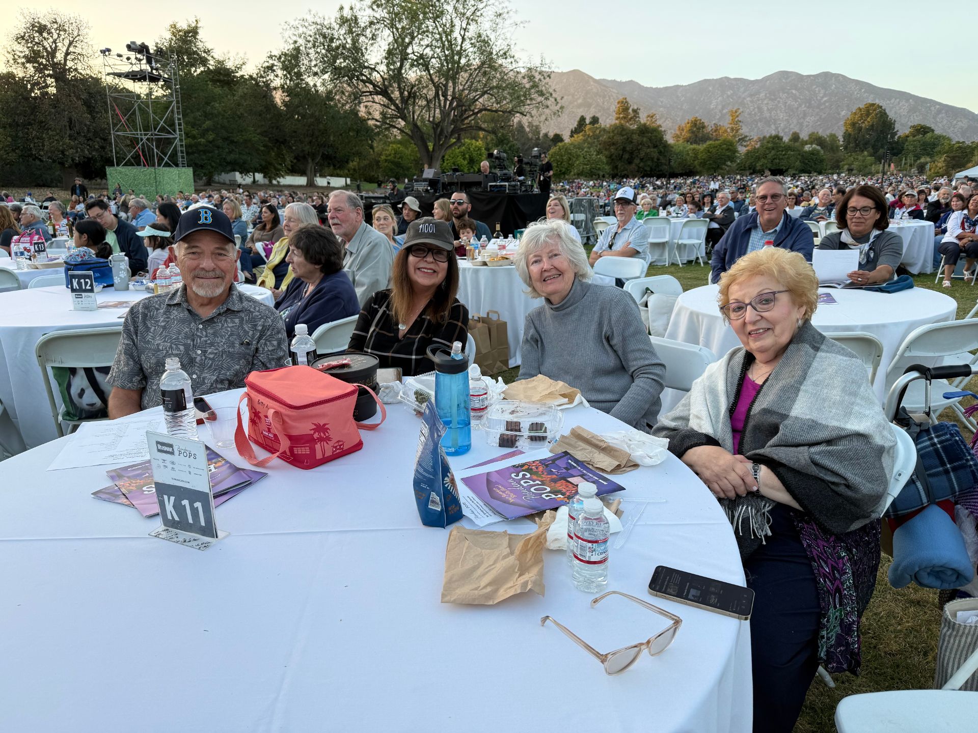 a group of people seated at a table at the Hollywood Bowl