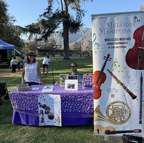 a business booth for Melodia Mariposa